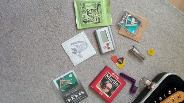 Tuner, capo, strings and things.